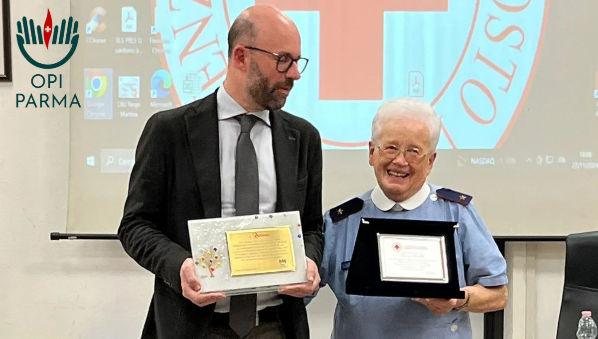 Premiazione Romana Demaldè da parte del presidente OPI Parma Dott. Walter Rossi